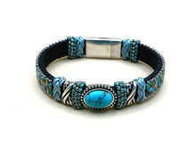 Load image into Gallery viewer, Bracelet with blue stone and braided design on a white background